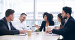 © peopleimages.com - Discussion, business people and team in office for strategy, brainstorming ideas and accounting. Collaboration, paper and planning with manager for financial revenue, bookkeeping or audit in meeting