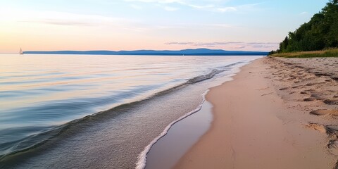 Aufkleber - A serene beach scene at sunset, featuring gentle waves lapping against the sandy shore and lush greenery in the background.