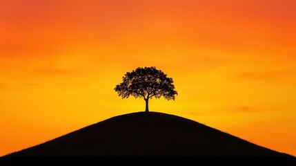 Poster - A solitary tree stands atop a hill, silhouetted against a vibrant orange sunset, creating a serene and picturesque landscape.