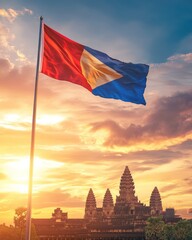 Poster - Flag waving in the wind against a scenic backdrop of a temple at sunset with vibrant colors and a dramatic sky