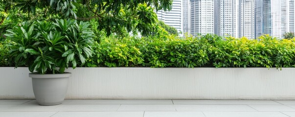 Aufkleber - A modern urban landscape featuring lush greenery in a planter against a backdrop of tall buildings.