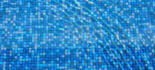 Wall Mural - swimming pool water surface and ripple wave with blue mosaic tiles