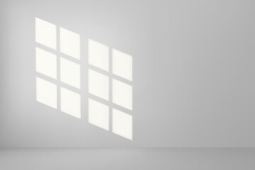 Wall Mural - white empty room illuminated by the sun rays on the wall.
