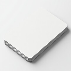 Poster - stack of blank white rounded corner business cards on a white background for mockup or design