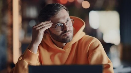 Nervous Man Looking At Display Of Laptop And Thinking About Investment And Business, Portrait