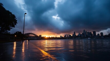 Poster - Stunning sunset over city skyline with dramatic clouds and reflections on the water surface : Generative AI