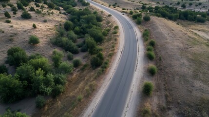 Aufkleber - Winding Road Through a Scenic Landscape Surrounded by Green Trees and Open Space : Generative AI