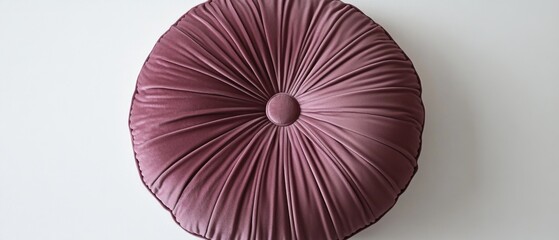 Aufkleber - A round cushion placed on a white wall