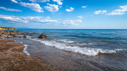 Aufkleber - Scenic view of rocky shoreline with gentle waves and clear blue water under a beautiful sky : Generative AI