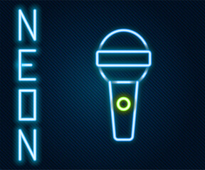 Poster - Glowing neon line Microphone icon isolated on black background. On air radio mic microphone. Speaker sign. Colorful outline concept. Vector
