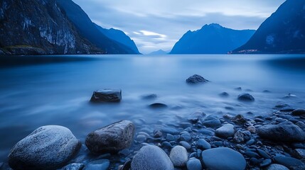 Poster - Tranquil Scenic View of Calm Water Surrounded by Majestic Mountains at Twilight : Generative AI