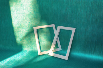 Poster - Minimalist design with two white frames on textured green background