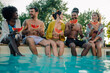 © Zamrznuti tonovi - Friends enjoying watermelon by the pool during summer vacation