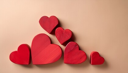 Wall Mural - red wooden hearts on beige background, vertical frame, minimalist love concept- 45911