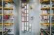 © Wadeen - Aerial View of Industrial Warehouse with Organized Storage Space