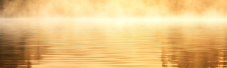 Poster - Golden light reflects on a calm water surface, creating a serene and tranquil atmosphere.