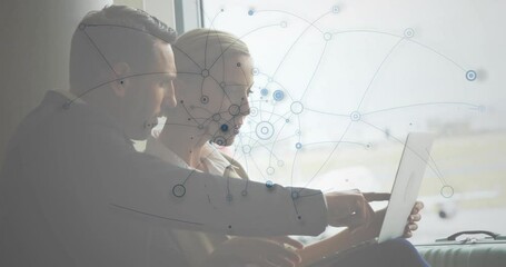 Poster - Collaborating on laptop, business professionals with network connections animation overlay