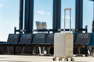 Fototapete - Travel, The suitcases in an empty airport hall, traveler cases in the departure airport terminal waiting for the area, vacation concept, blank space for text message or design