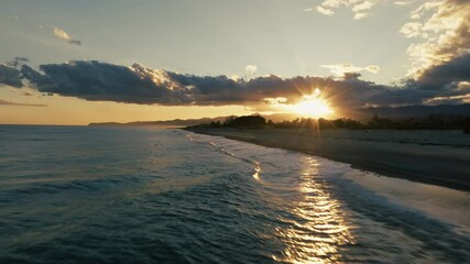 Wall Mural - Heavenly Sea Waves In Winter At Sunset With Clouds