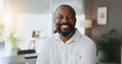 © C.D./peopleimages.com - Mature, portrait and confident black man in office as proud project manager in Kenya for development. Opportunity, professional and entrepreneur of startup company with mission or business commitment