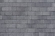 © Muhammad - Texture of asphalt shingle​ wall. Abstract shingles bricks texture, Geometric pattern background, Details of wall material, Can be used as background for display or montage your products. Side view.