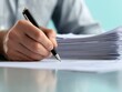 © logitech - Person writing on documents
