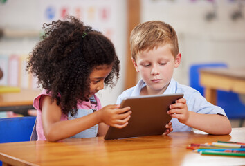 classroom, tablet and children learning together, studying and education in preschool. students, tec