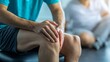 © Oulaphone - Knee rehabilitation techniques by physiotherapist clinic setting instructional video indoor environment close-up angle