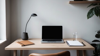 Poster - Minimalist workspace featuring a laptop, notebooks, and a plant in a bright, modern room