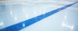 © Jiampoj - Elevated view of painted blue line on an ice rink, winter background, boundary, surface
