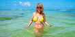 © Kaspars Grinvalds - Portrait of woman posing in tropical water