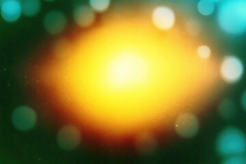 Aufkleber - vibrant, abstract background with glowing yellow center surrounded by green and blue bokeh lights, creating dreamy and ethereal atmosphere