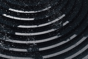 Aufkleber - Abstract image featuring concentric circular patterns with scattered particles, creating sense of chaos and movement. dark background contrasts with lighter circular lines, enhancing dynamic
