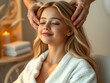 © Iva Noel - A smiling young girl with long wavy blonde hair in a salon where she gets a massage