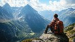 © RaNy - A hiker resting on a rock, gazing at a breathtaking mountain view.