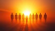 © Khmel - Silhouettes of people against a vibrant sunset horizon