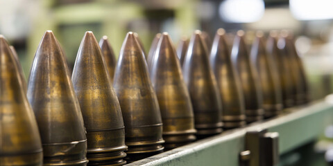 Fototapete - New metal mm artillery shells lined up for assembly Generative AI