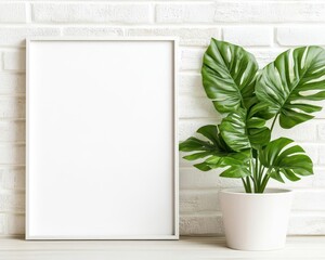 Poster - Monochrome Minimalist Poster Mockup Framed and Leaning Against a White Brick Wall