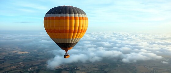 Wall Mural - A vibrant hot air balloon floats above the clouds, showcasing a stunning view of the sky and landscape below.