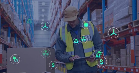 Poster - using tablet, warehouse worker with eco-friendly icons overlaying screen