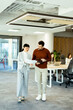 © BGStock72 - Collaboration flourishes in a modern workspace during a productive business day