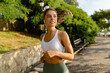 © mary_markevich - pretty young blond smiling woman doing sport exercises in morning park