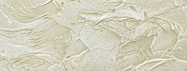 Wall Mural - texture decorative beige plaster background imitating the old peeling wall, macro. obsolete sand cra