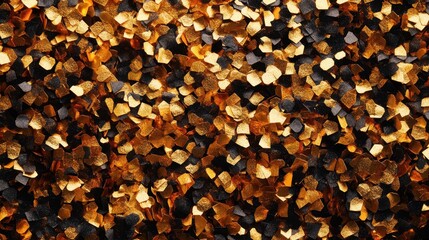 Poster - Glittering golden and black confetti scattered on a surface for festive decoration