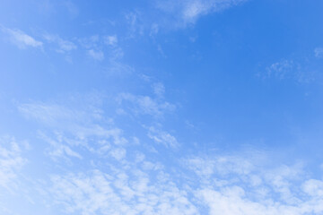 Wall Mural - beautiful blue sky and white fluffy group of clouds with sunrise in the morning, natural background