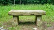 © Moree - Weathered Stone Bench in a Sunny Grassy Field