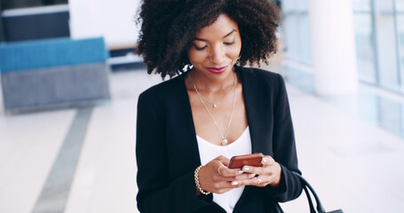 Poster - Typing, phone and business African woman in office for email, networking and communication. Professional, corporate and worker on smartphone for internet, research report and planning on mobile app