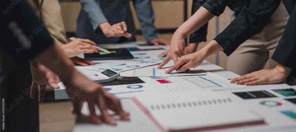 Business team analyzing financial data and company's performance ...