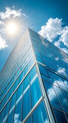 Poster - Under a radiant sun, the sleek glass facade of a contemporary business building glimmers with reflections of fluffy clouds and vibrant blue sky, embodying modern architecture and innovation