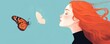 © Georgii - Silhouette of a woman with vibrant red hair and a colorful butterfly